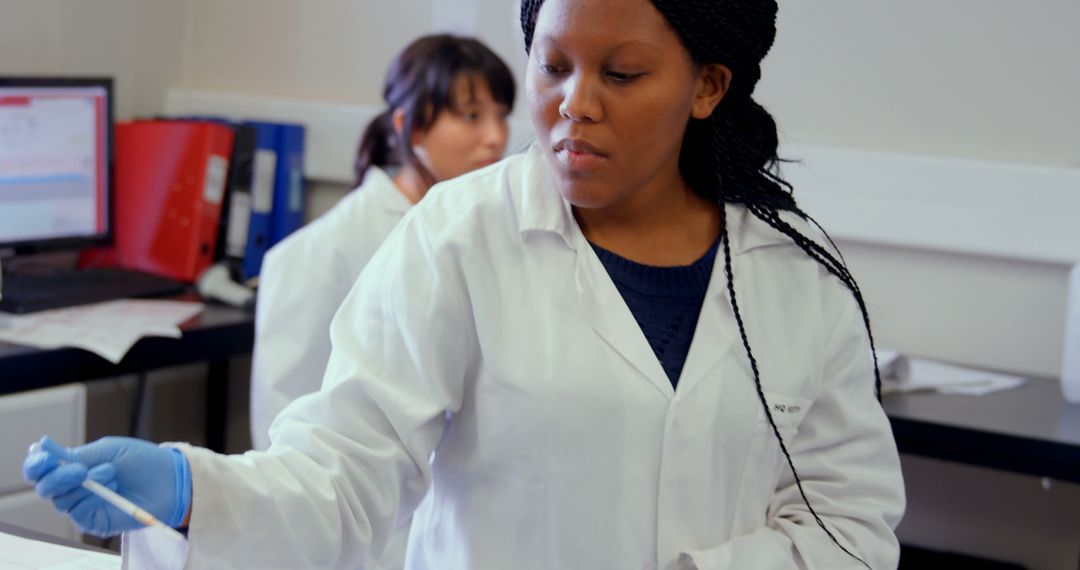 Scientists Conducting Laboratory Experiments in White Coats - Free Images, Stock Photos and Pictures on Pikwizard.com