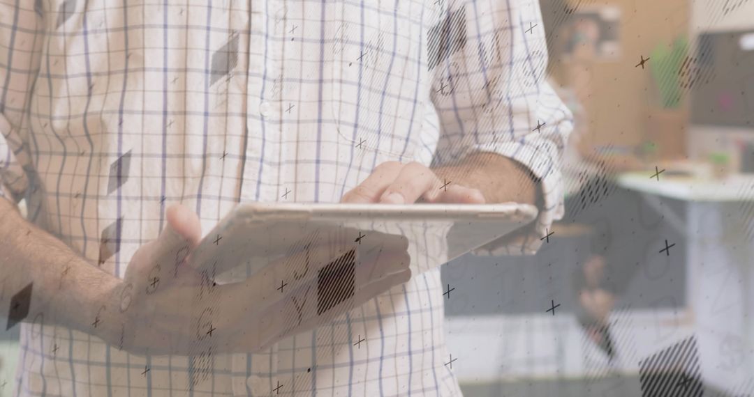 Man tapping tablet with digital overlays in modern office workspace for corporate tech
