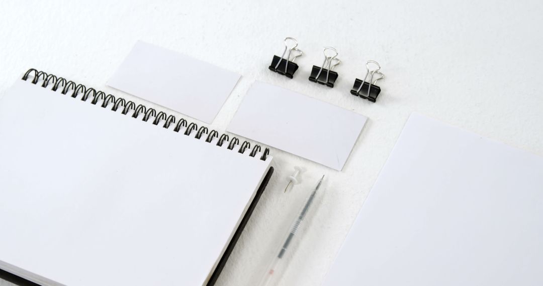 Blank business cards are displayed on a spiral notebook, with copy space - Free Images, Stock Photos and Pictures on Pikwizard.com
