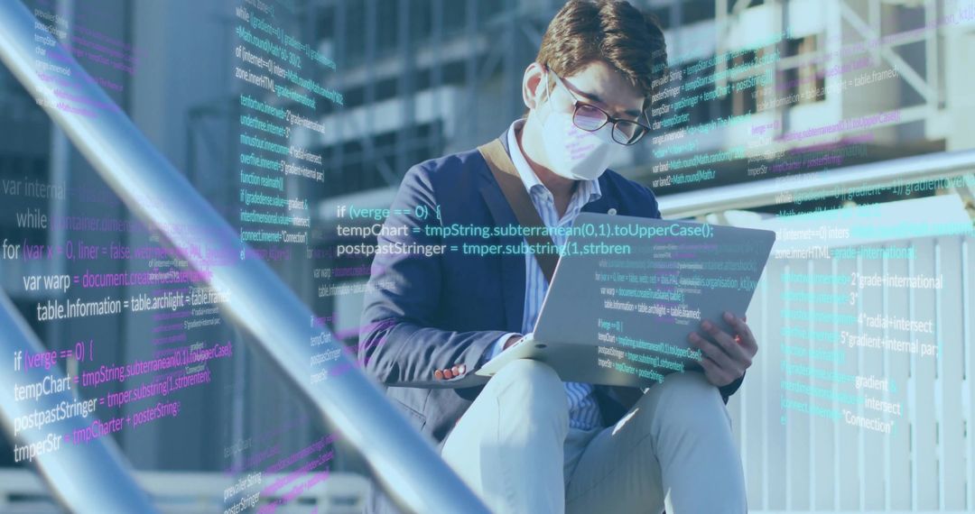 Professional Man Coding On Laptop In Modern Urban Environment