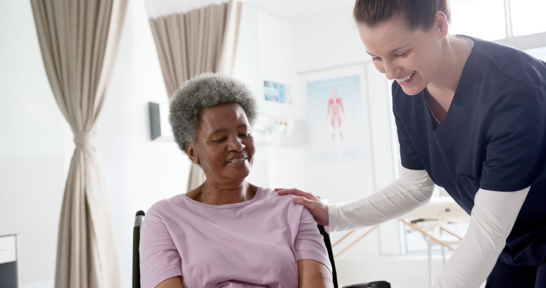 Smiling Nurse Assisting Senior Woman in a Caring Environment - Free Images, Stock Photos and Pictures on Pikwizard.com