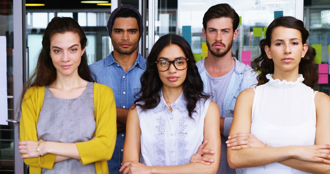 Confident Diverse Team Facing Camera in Modern Office - Free Images, Stock Photos and Pictures on Pikwizard.com