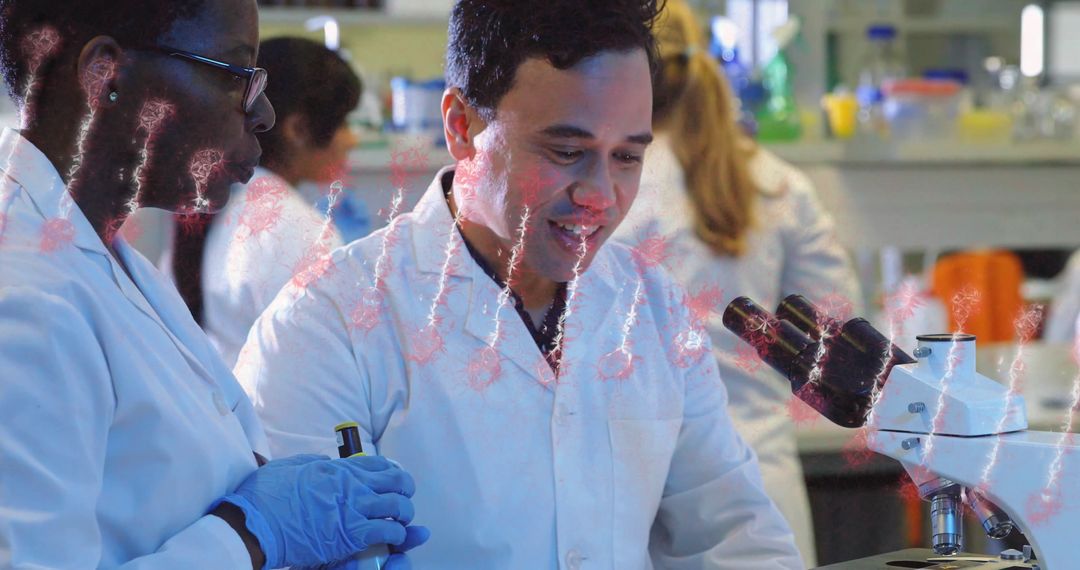 Scientists Collaborating in Modern Laboratory Microscope Analysis