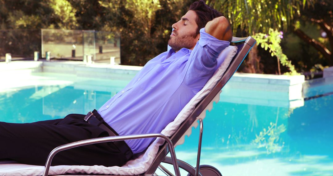 Businessman Relaxing by Poolside in Outdoor Setting - Free Images, Stock Photos and Pictures on Pikwizard.com