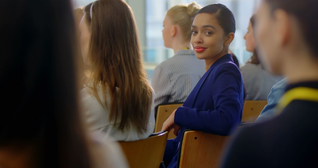 Diverse Woman Smiling in Classroom, Engaged Learning