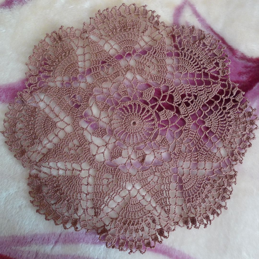 Handmade Crochet Doily on Soft Fabric Background - Free Images, Stock Photos and Pictures on Pikwizard.com