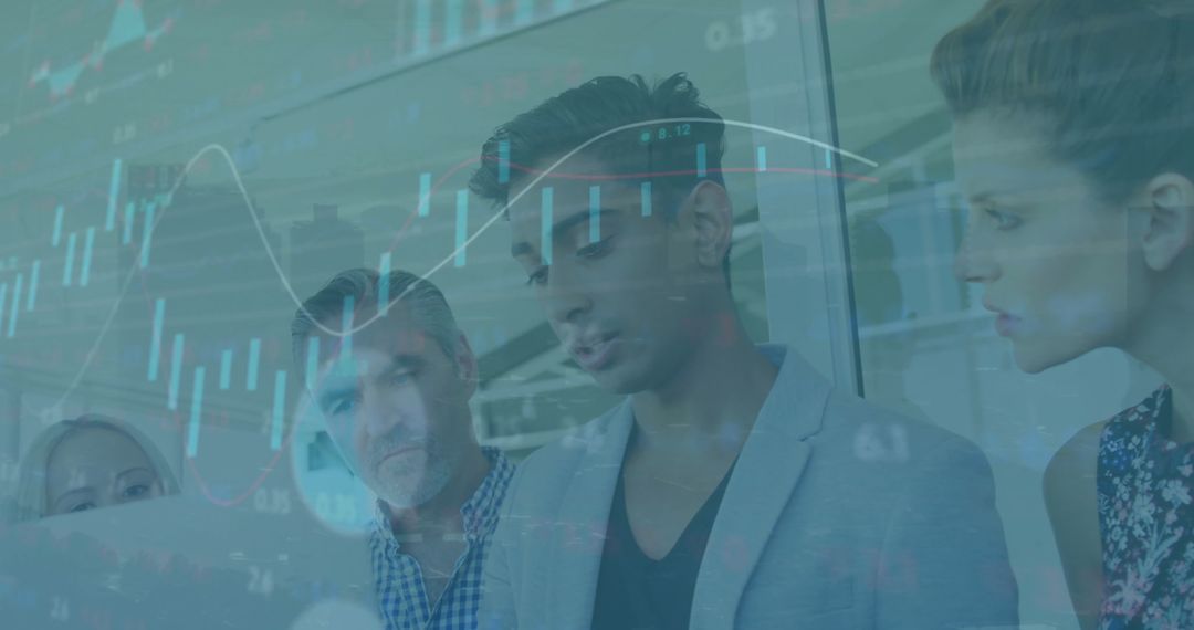 Team Analyzing Financial Graph in Modern Office Setting