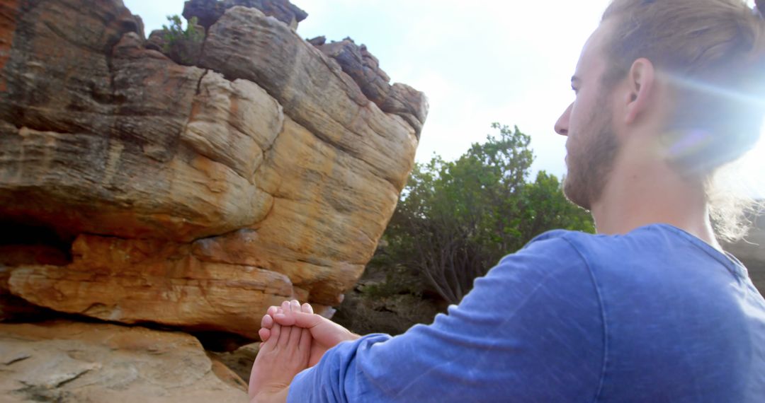 Man Practicing Yoga Meditation in Rocky Outdoors - Free Images, Stock Photos and Pictures on Pikwizard.com