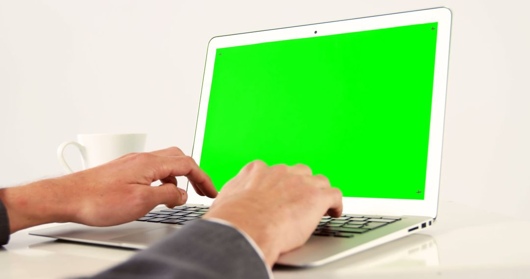 Using Laptop with Green Screen for Editing Mockups - Free Images, Stock Photos and Pictures on Pikwizard.com