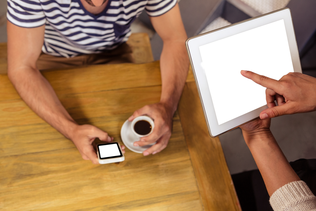 Transparent Screen Interaction with Tablet and Phone at Cafe - Download Free Stock Images Pikwizard.com