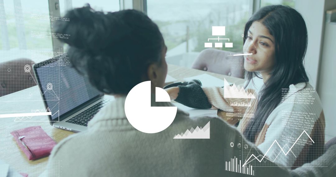 Mentee and Mentor Analyzing Data Charts with Laptop and Notebook