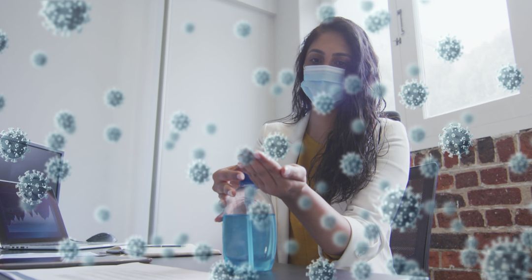 Woman in Office Using Hand Sanitizer amid Covid-19 Outbreak