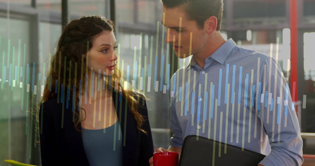 Professionals Analyzing Digital Data Visualization in Modern Office