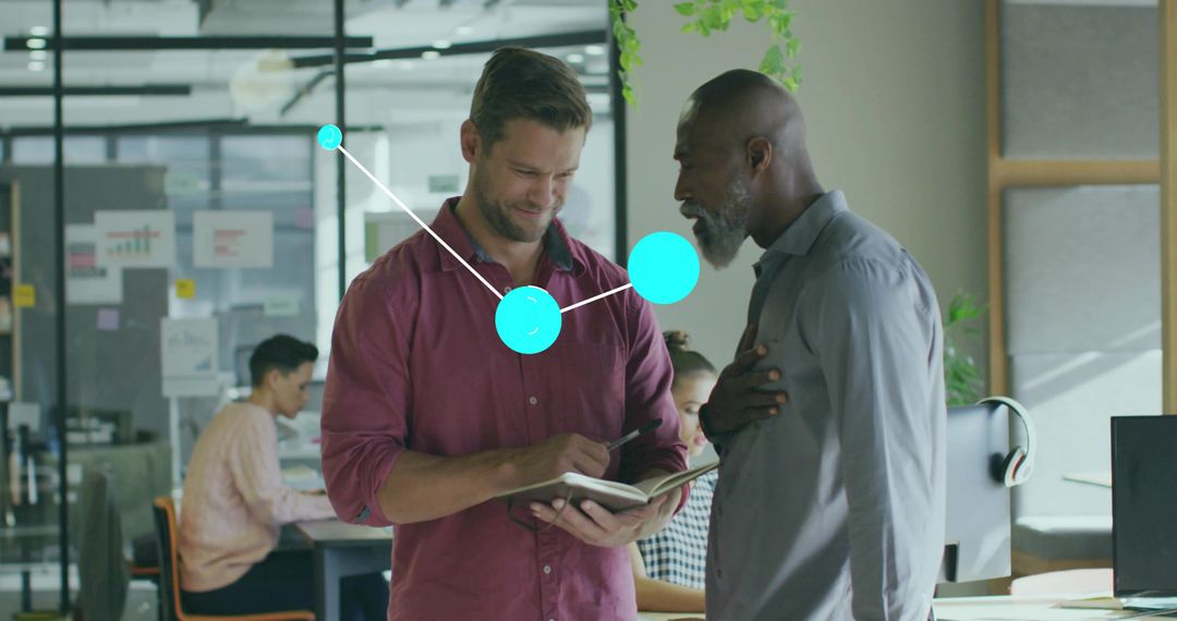 Colleagues Collaborating in Modern Office with Plants