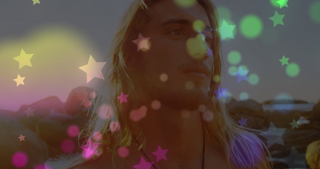 Man Strolling on Seaside Rocks with Starry Overlay