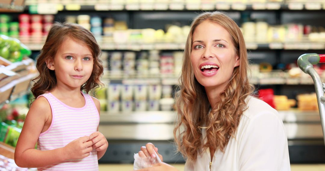 Mother and Daughter Shopping in Grocery Store - Free Images, Stock Photos and Pictures on Pikwizard.com