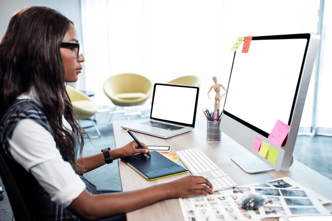 Transparent Office Workspace with Focused Businesswoman