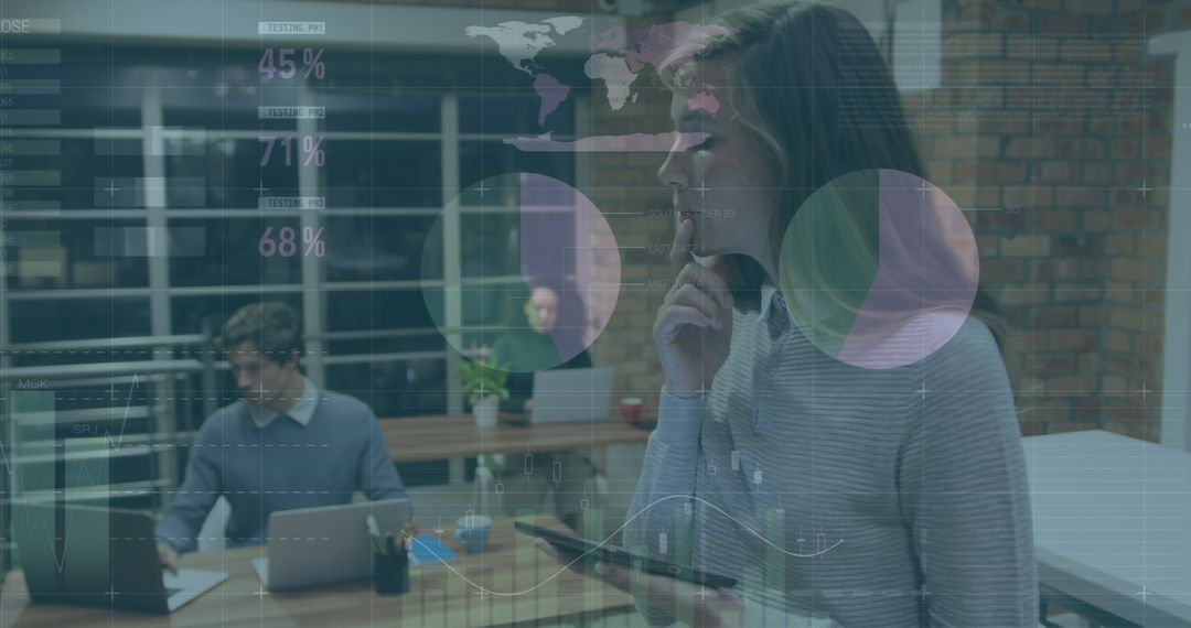 Business Colleagues Analyzing Digital Financial Data in Modern Office