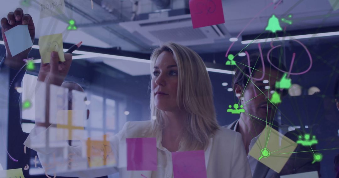 Business Team Brainstorming with Network Interface Visuals