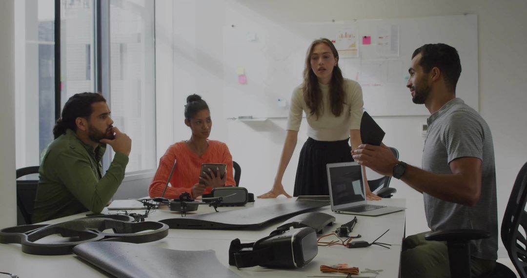 Team Brainstorming with Drone Equipment and Technology Gear