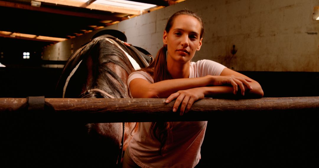 Female Horse Trainer Bonding with Horse in Stable - Free Images, Stock Photos and Pictures on Pikwizard.com