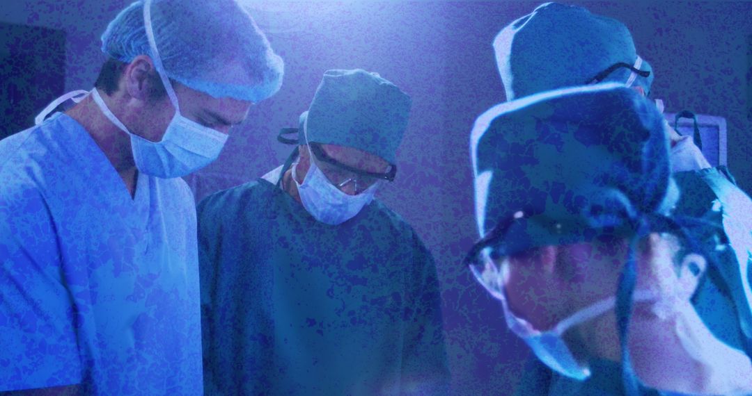 Focused Team of Surgeons Performing Complex Operation