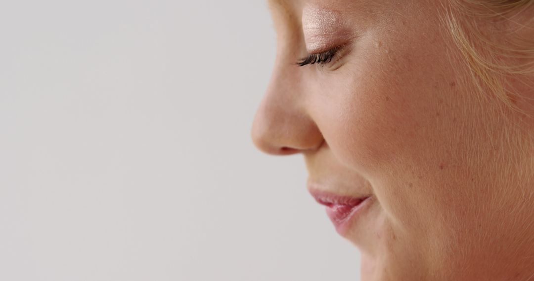 Peaceful Contemplation of a Young Woman with Closed Eyes and Soft Expression
