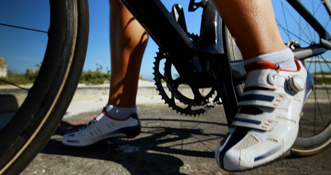 Close-up of Cyclist's Legs and Pedals While Riding - Free Images, Stock Photos and Pictures on Pikwizard.com