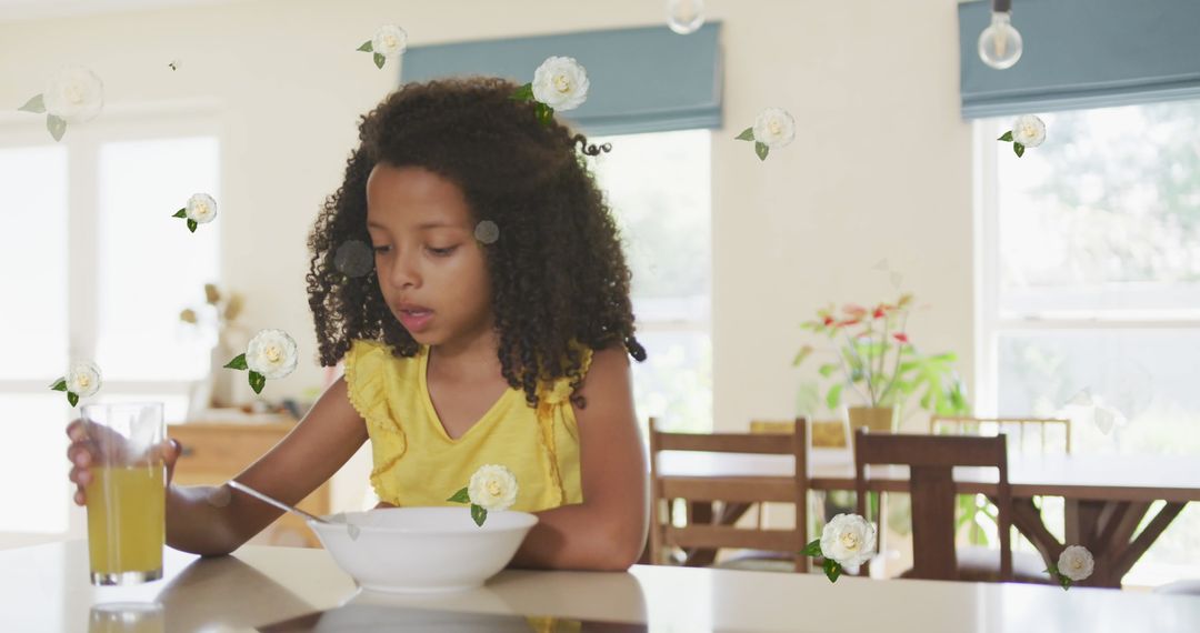 Child Enjoying Breakfast with Floral Overlay in Modern Kitchen