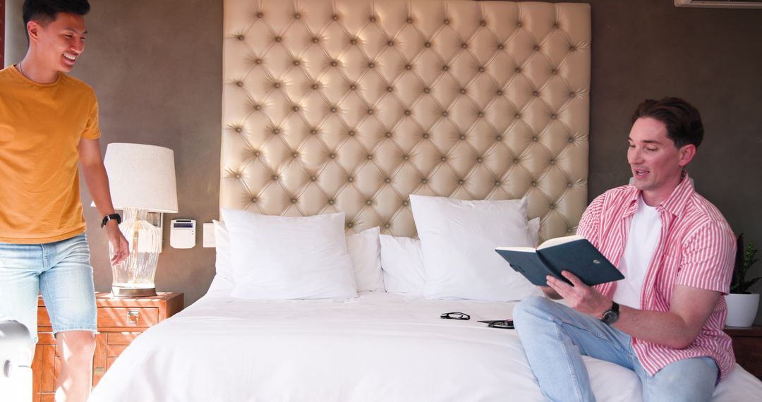 Diverse Male Couple Relaxing at Home, Sharing Quality Time