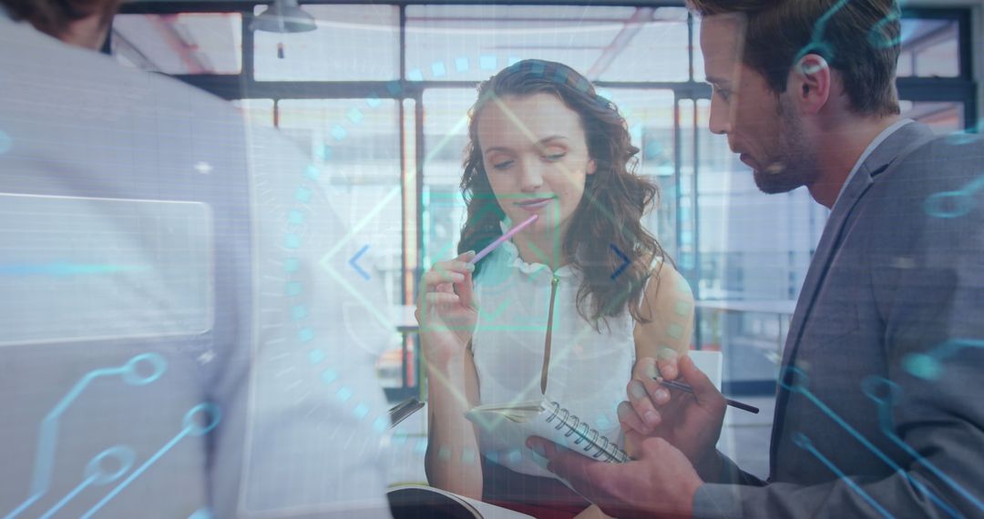 Professionals Collaborating in Modern Office with Digital Interface