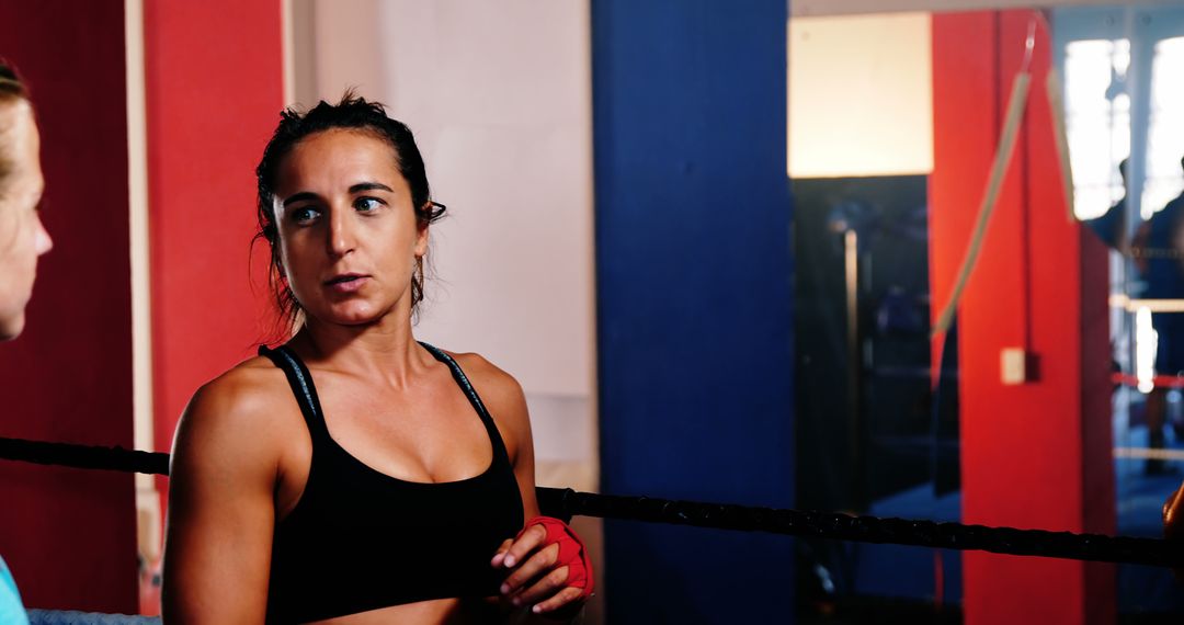 Female Boxer Receiving Instructions in Gym - Free Images, Stock Photos and Pictures on Pikwizard.com