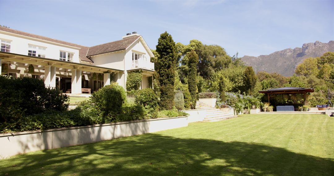 Beautiful House with Garden and Mountain View on Sunny Day