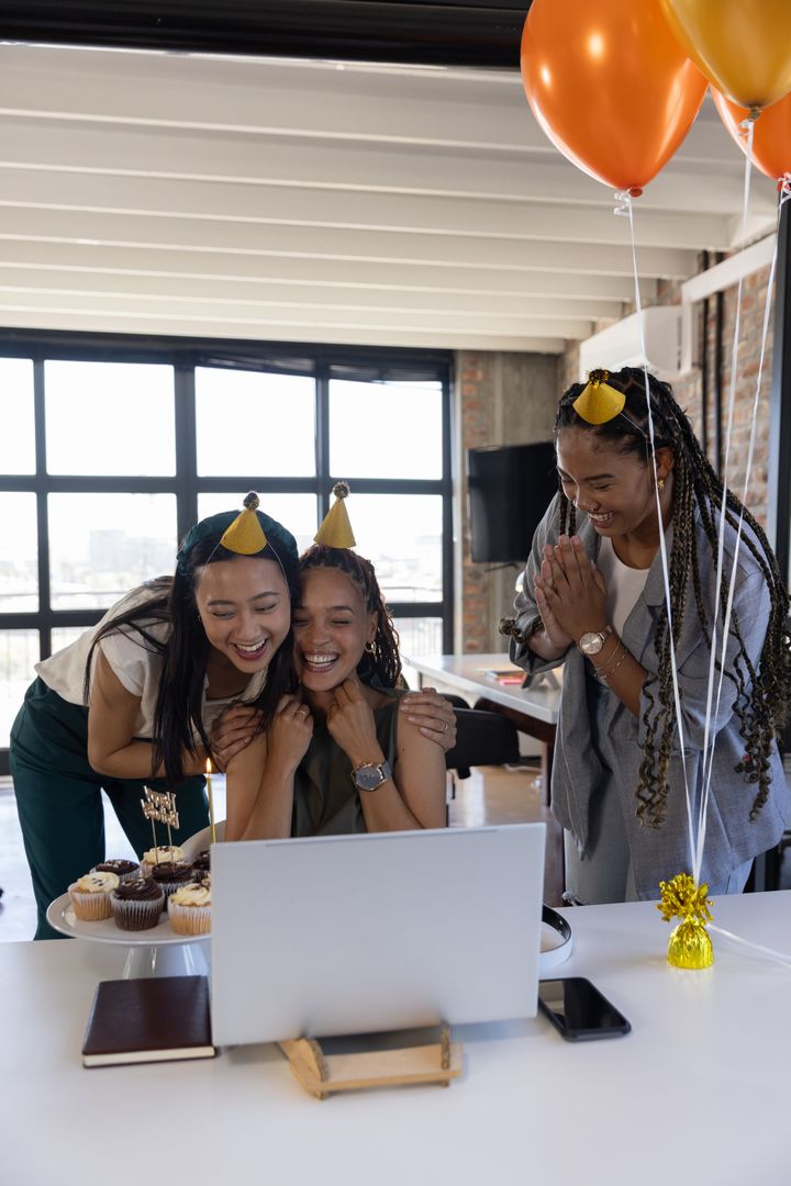 Coworkers Celebrating Birthday Virtually with Party Hats