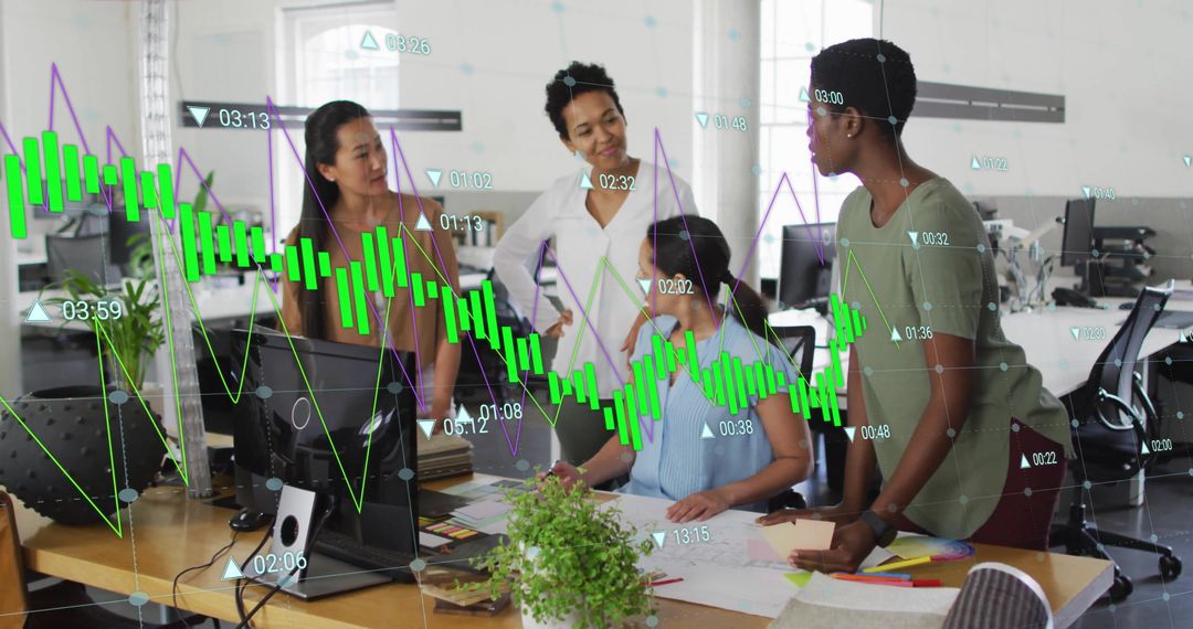 Diverse Business Team Analyzing Live Data in Modern Office