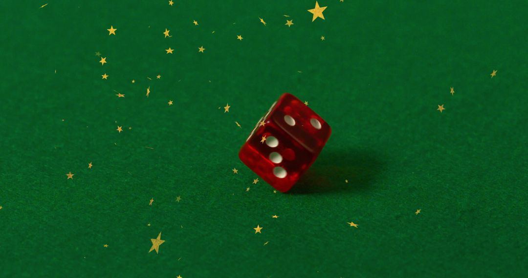 Falling Starry Dice on Green Felt Surface