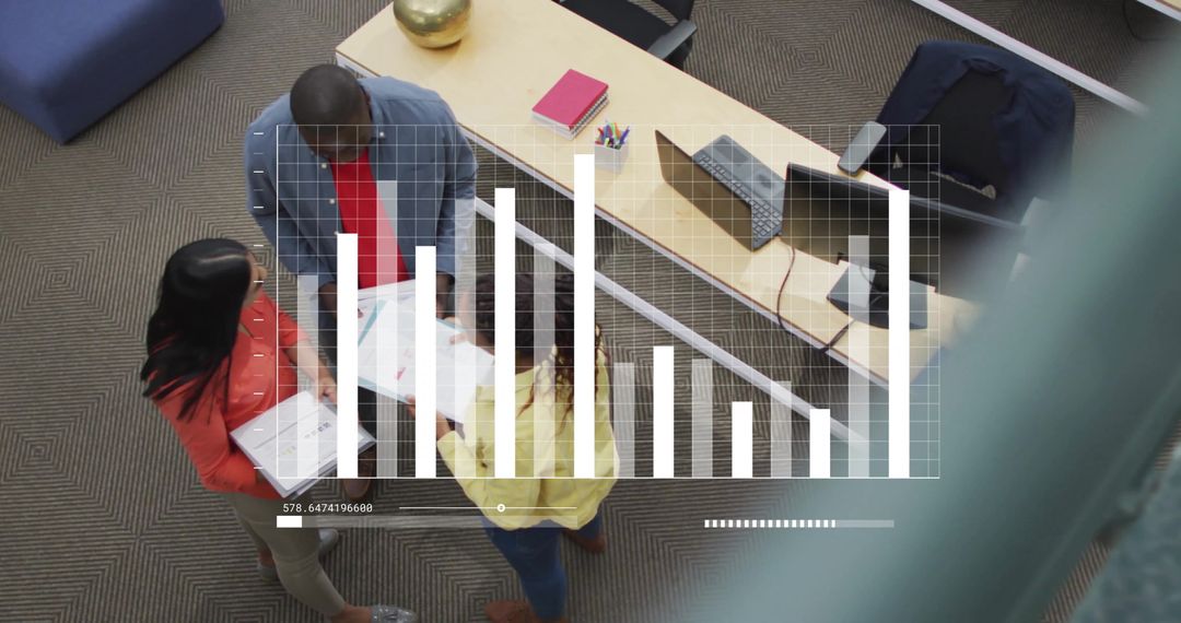 Diverse Professionals Analyzing Business Charts and Data