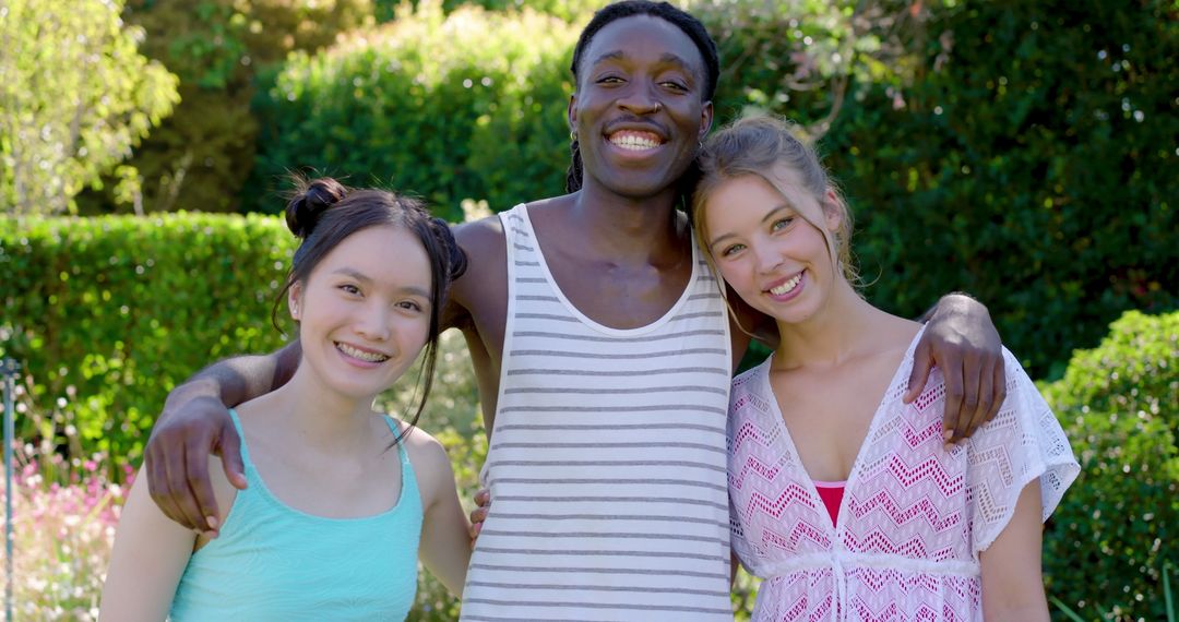Diverse Friends Enjoying Summer Day in Garden