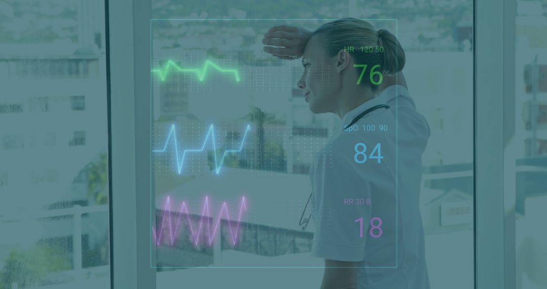 Nurse Monitoring Vital Signs With Digital Technology Overlay in Hospital