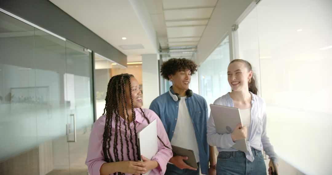 Diverse Students Engaging with Technology in School Hallway