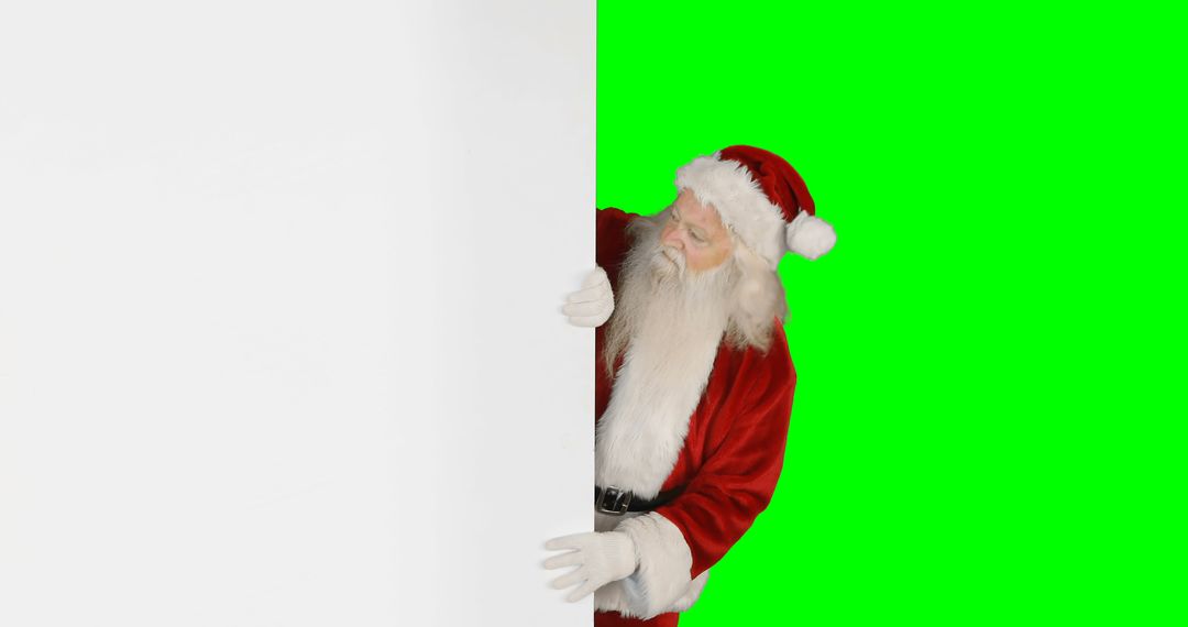 Santa Claus Peeking Behind White Board with Green Background - Free Images, Stock Photos and Pictures on Pikwizard.com