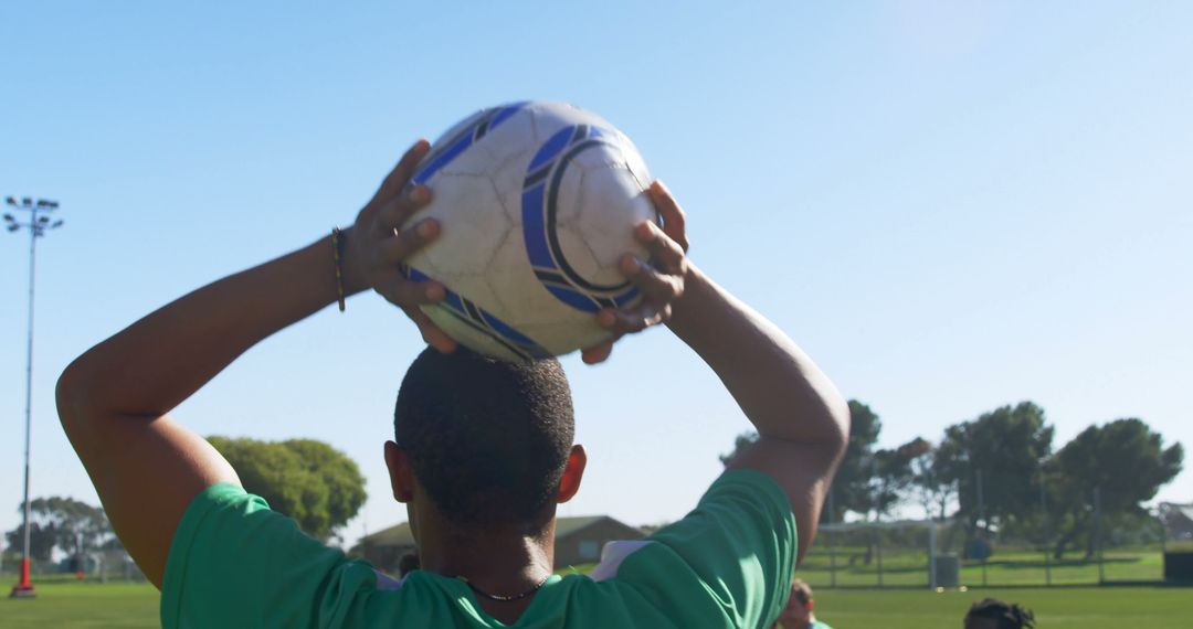 Player Throwing Soccer Ball During Game Outdoors - Free Images, Stock Photos and Pictures on Pikwizard.com