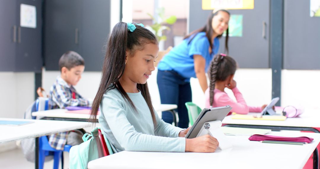 Elementary Student Using Tablet in Classroom for Digital Learning