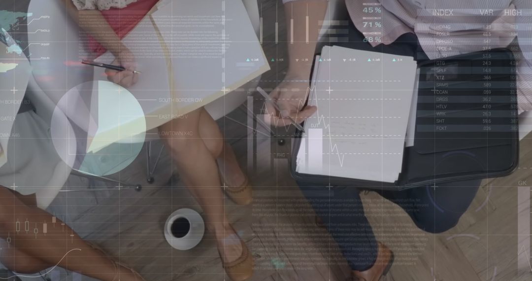 Business Colleagues Analyzing Data Documents