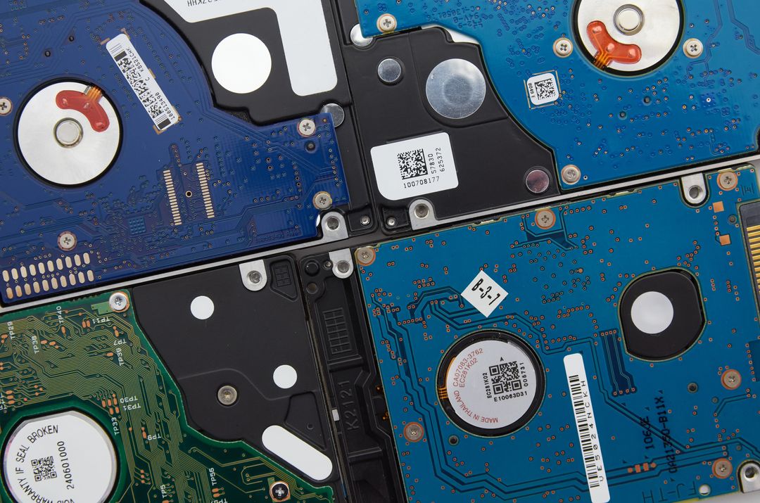 Close-up View of Various Hard Drive Components with Circuit Boards