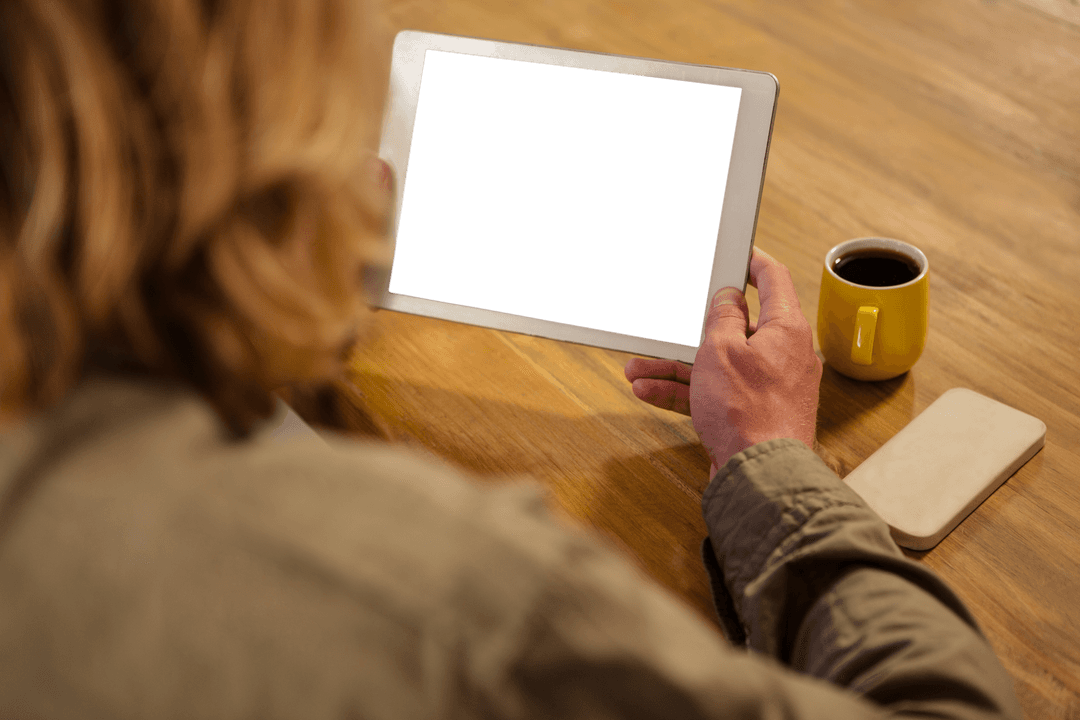 Woman Holding Digital Tablet in Cafe with Yellow Cup and Transparent Screen - Download Free Stock Images Pikwizard.com