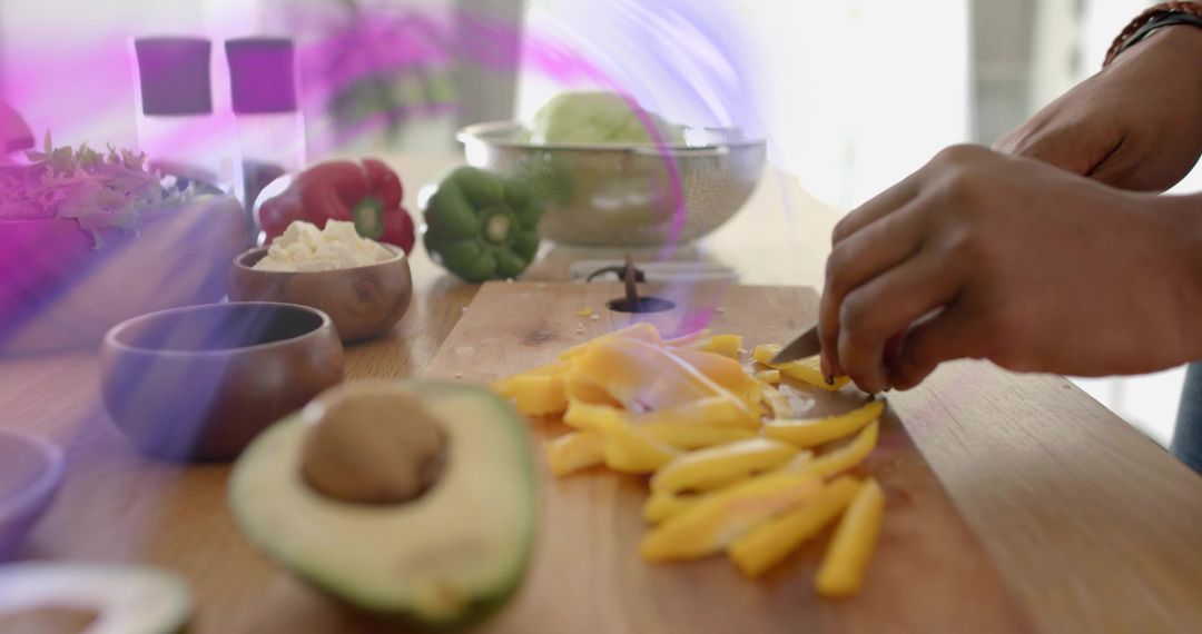 Hands Slicing Yellow Bell Pepper in Minimalist Kitchen