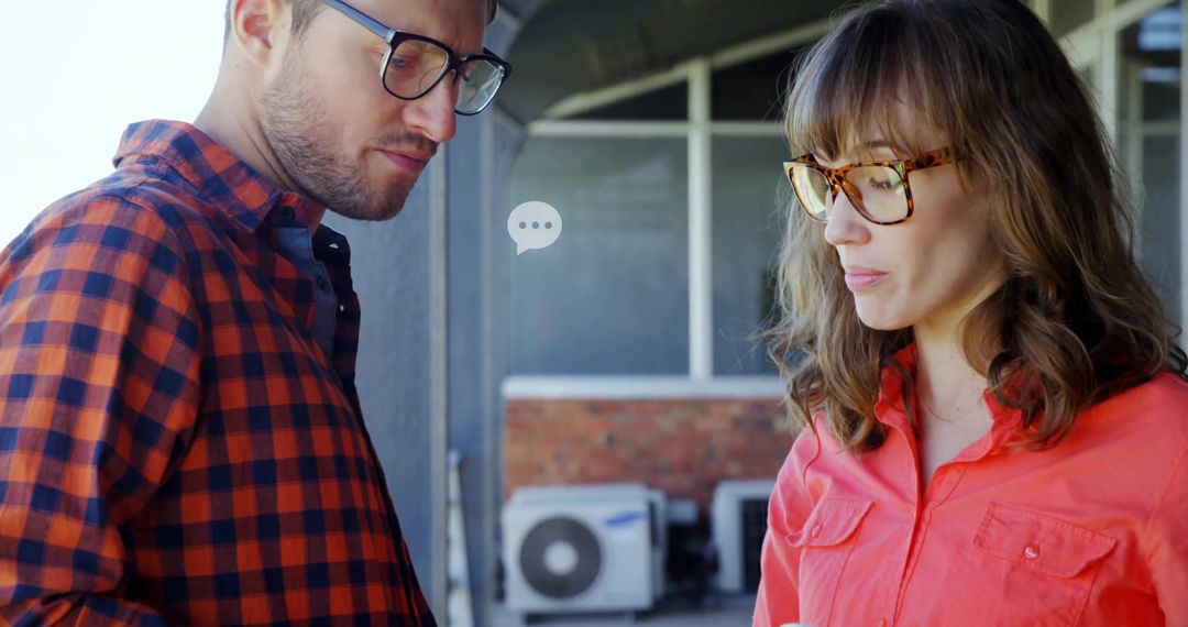 Colleagues Collaborating on Outdoor Veranda