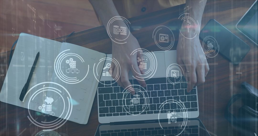 Hands Typing on Laptop with Media Icons Overlay in Modern Office