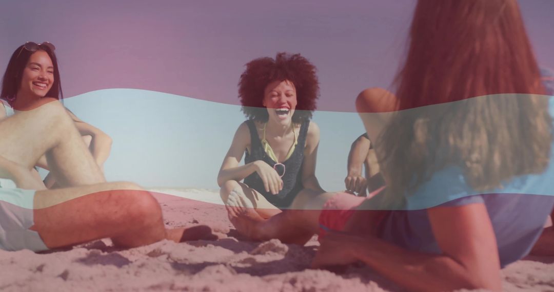 Friends Relaxing on Sunny Beach in Swimwear Having Fun